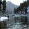 Idaho fishing from the ice down the Salmon River located near Moose Creek Estates premier Rocky Mountain real estate