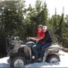 Idaho 4-wheeling trails leading to the top of the world near Moose Creek Estates premier Idaho mountain real estates. Dylan and Jessica in the snow at 10,500 feet above sea level and 6,500 feet above Salmon, ID