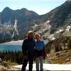 Idaho hiking trails take you to beauitful  high mountain lakes.  Friends on the continental divide looking down on Upper Miner Lake in Montana.  Note the glaciers in the background in this September photo.