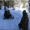 On the snowmobile trails in the mountains with good friends near Moose Creek Estates Idaho land for sale.