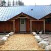 Idaho Mountain Home for sale viewed from the south (garage entry door) at Moose Creek Estates - premier Idaho mountain real estate