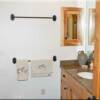 Walkout basement  bathroom with granite countertops and plenty of storage space for your guests.