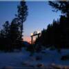 Coming home to Moose Creek Estates through the inviting gated entry as the slowly setting sun brings out a magnificent star filled night sky.