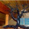 Close up image of the beautiful hand forged Quaking Aspen Chandelier that took 3 to 5 people five months to handcraft